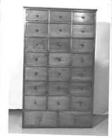 SA0652 - Photo shows a tall pine chest belonging to the Golden Lamb, Lebanon, Ohio. Identified on the back., Winterthur Shaker Photograph and Post Card Collection 1851 to 1921c